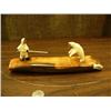 Image 1 : White walrus ivory hunter and bear 2.5" tall circa 1960 mounted on 9" approx. 9 lb. chocolate brown 