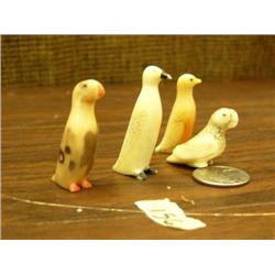 Lot of 4: two inch scrimshawed ivory birds circa 1960 (148)