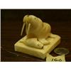 Image 1 : 3" ivory walrus and seal mounted on white ivory case circa 1960 (148)