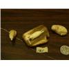 Image 1 : Lot of 3 carvings - 2" ivory seal mounted on fossil. Ivory 1.5" sitting polar bear and 1.75" fabulou