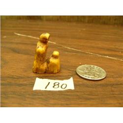 Pair of 1.25" ancient ivory doll (148)