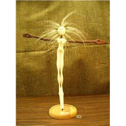 14" carving by Susie Silook done in 1999 - minimum bid $3500.00 (2)