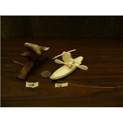 Lot 2: three and a half inch whale bone humpback whale by Kay Felber and 5" ivory kayaker with seal 