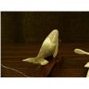 Image 9 : Lot 2: three and a half inch whale bone humpback whale by Kay Felber and 5" ivory kayaker with seal 