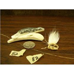 Lot of 2: spotted ivory seal 3.5" long by Roger Silook, Sr. and polar bear hide ring (152)