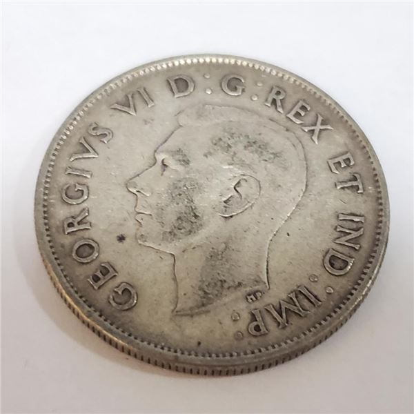 Silver 50 Cents Canadian Coin (~Size 0) (~length 0 inches), Suggested Retail Value $80