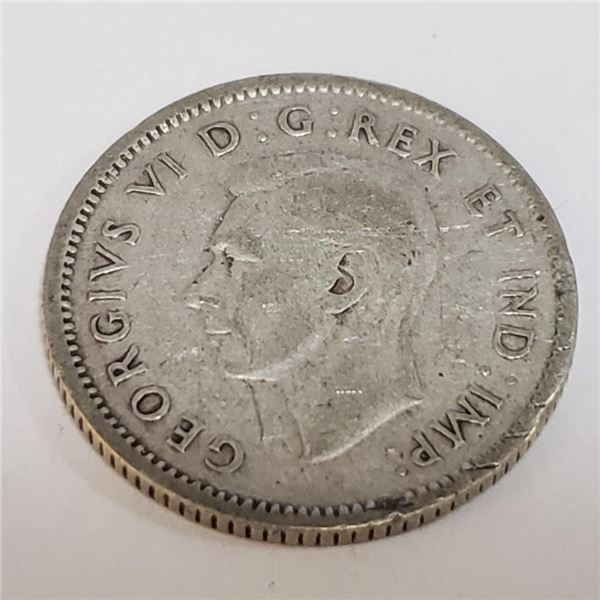 Silver 10 Cents Canadian Coin (~Size 0) (~length 0 inches), Suggested Retail Value $60