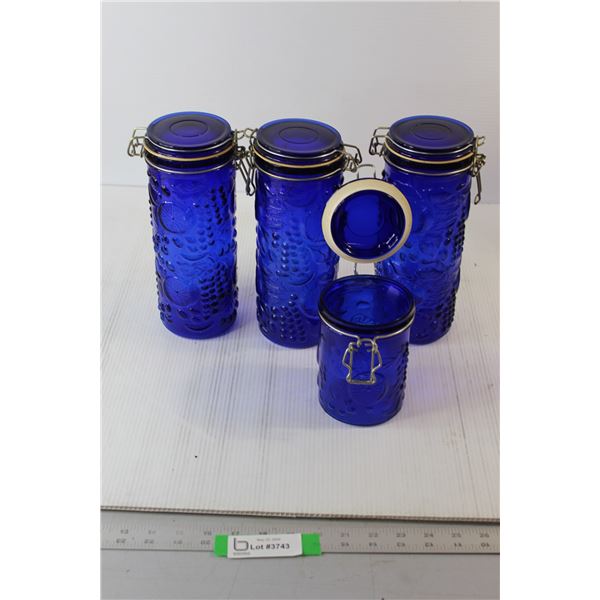 (4) Blue Glass Canisters