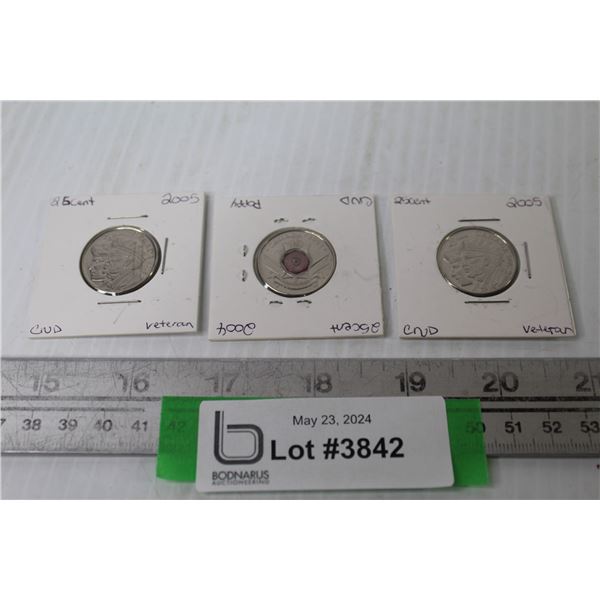 (2) Collector Canadian Quarters - Veteran; (1) Collector Canadian Quarter - Poppy