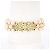 Image 1 : 14k Yellow Gold 7.25" 1.25 ctw Diamond Covered Clasp 3 Row Cultured Pearl Bracel