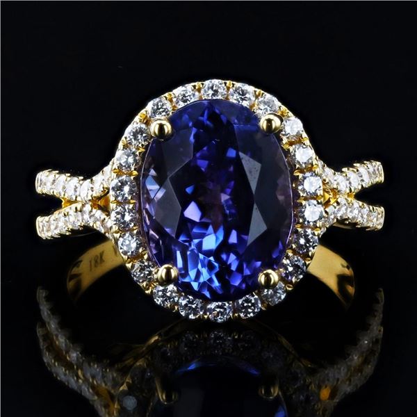 5.82 ctw Tanzanite and 0.69 ctw Diamond 18K Yellow Gold Ring