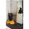 Image 1 : 5 RUBBERMAID GARBAGE BINS, CONVERTIBLE DOLLY, ASSORTED SHOVELS, BROOMS RAKE AND SANDWICH BOARD