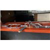 Image 2 : CONTENTS ON TOP OF BAR; ASSORTED CABLE HANDLES, WEIGHT LIFTING BELTS, HOCKEY STICK AND MORE