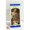 Image 1 : 13" PORELAIN DOLL ON SWING