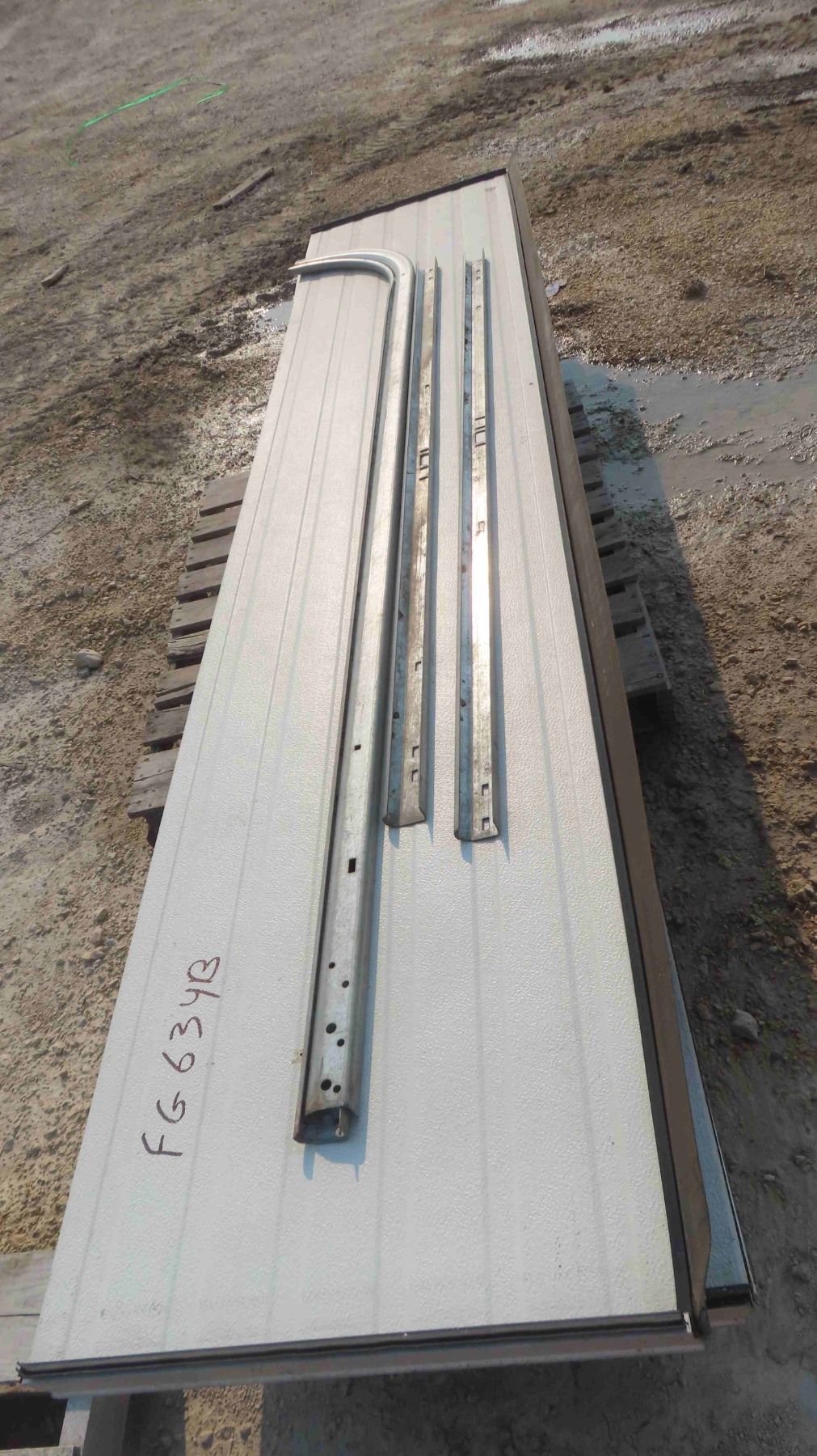 (6) 10ft Garage Door Panels & Some Rails