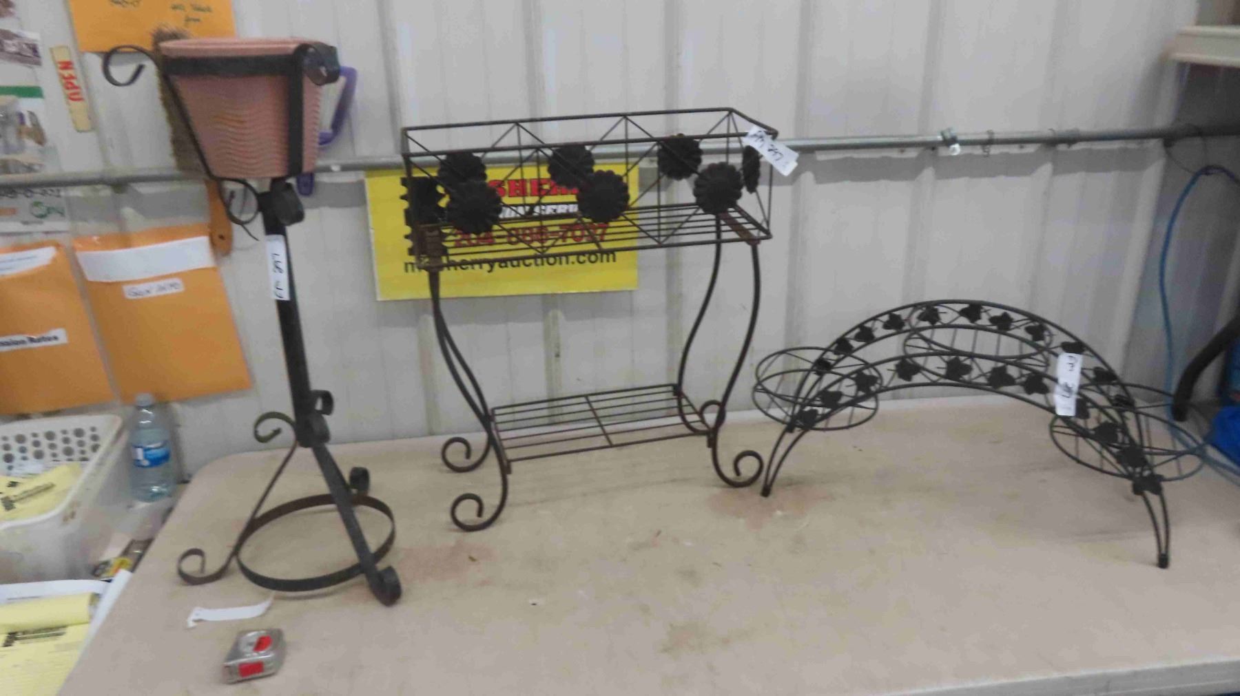 4 Wrought Iron Planters 4 wrought iron planters