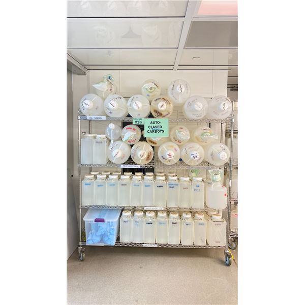 4 TIER MOBILE METRO RACK WITH ASSORTED CARBOYS - Able Auctions