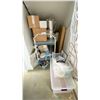 Image 1 : CONTENTS OF ROOM BEHIND WATER FILTRATION SYSTEM; MOBILE CART, STAINLESS STEEL BOTTLES, CASTER