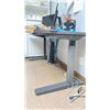 Image 2 : GREY SIT TO STAND ELECTRIC DESK APPROX 5' X 2.5' (CONTENTS NOT INCLUDED)