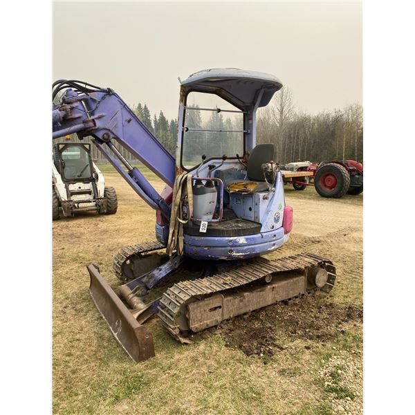 Komatsu 38 Trackhoe, Blade & Steel Tracks, 4549 hrs. Extra Bucket sells Lot# 120A