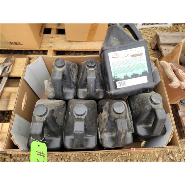 Approx. 8- Jugs of D-MO gold oil (selling all together)