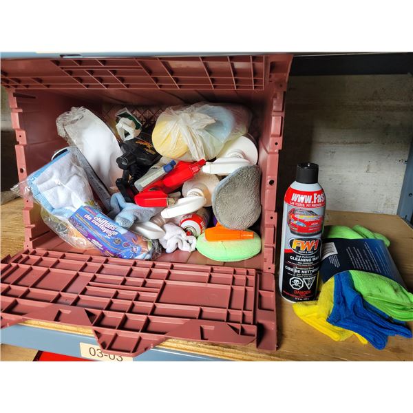 Tote of cleaning supplies