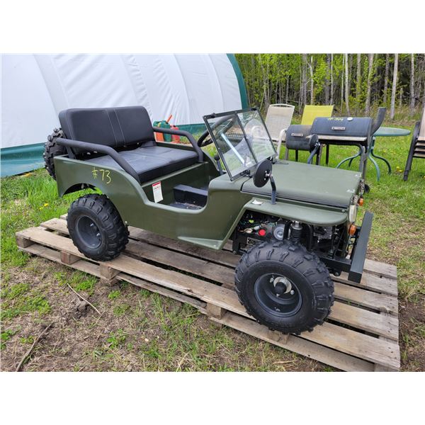 As New Miniature Jeep c/w gas motor, maybe 2 hours on it, SN. L37AMHBV1LZ060117