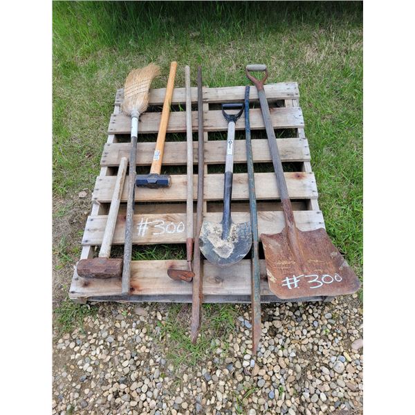 Pallet of shovels, bars, hammers