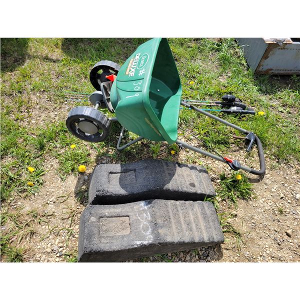2- Rubber wheel chucks, fertilizer spreader, fishing rods