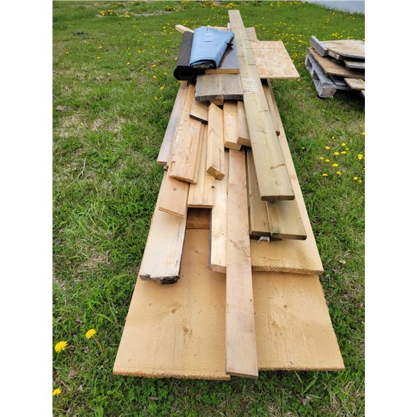1- Lot of misc. lumber & rubber rolls