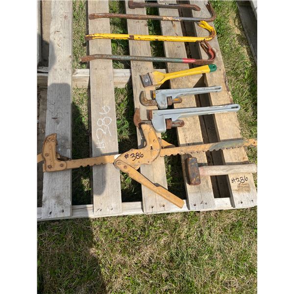 Pallet of crowbars, pipe wrench's & wire stretchers