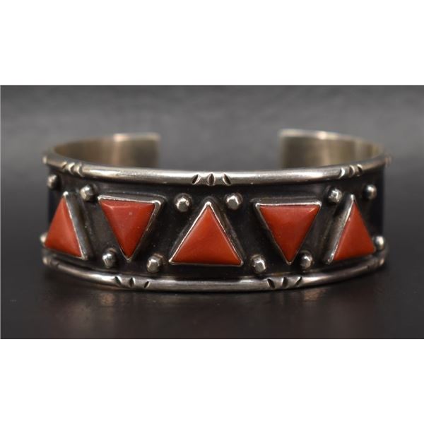 NAVAJO SILVER AND CORAL BRACELET