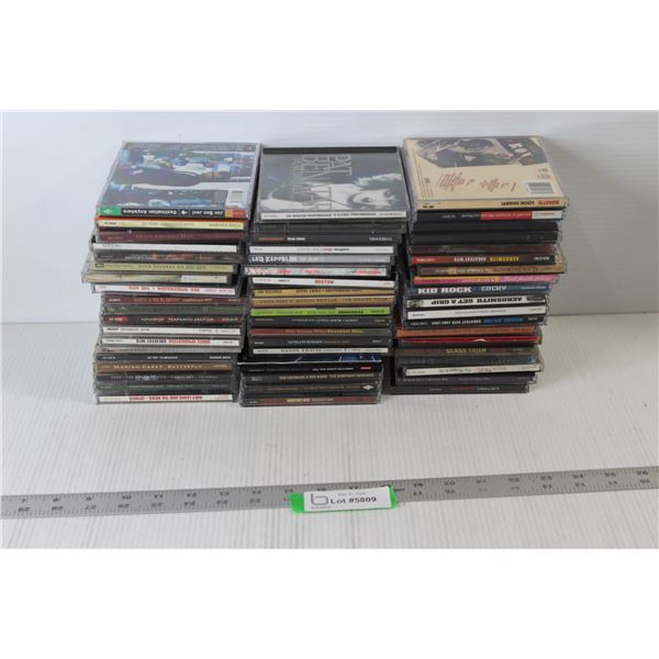 (57) Assorted CD's - Queen, Kid Rock, Aerosmith