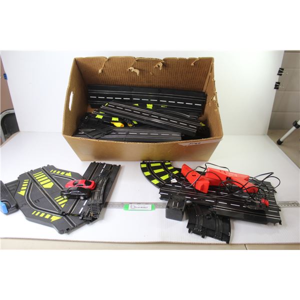 Box of Slot Car Track - (2) Controllers - (2) Slot Cars (untested - unknown completion)