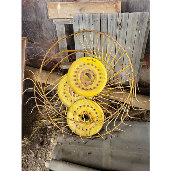 2- Hay rake wheels (missing teeth)