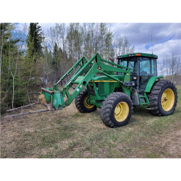 Approx. 1997 JD 7410 FWA Tractor, showing 6425 hrs, 120 Hp, c/w 740 Loader & bale forks (Bucket & gr