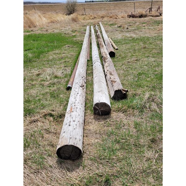 4- power poles & 2- pipes