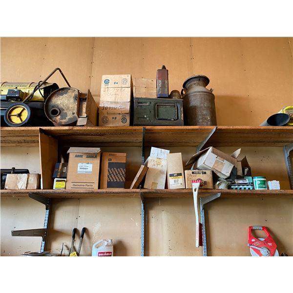 Items on 2 top shelves, heater, cream can, filters, raft etc.