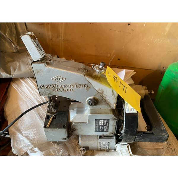 New long ind. electric bag stitcher. C/w bags.