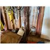Image 8 : Exhaust hose, chains, 2 red hyd. rams, air hose, rain jackets, rope. All items on north wall.