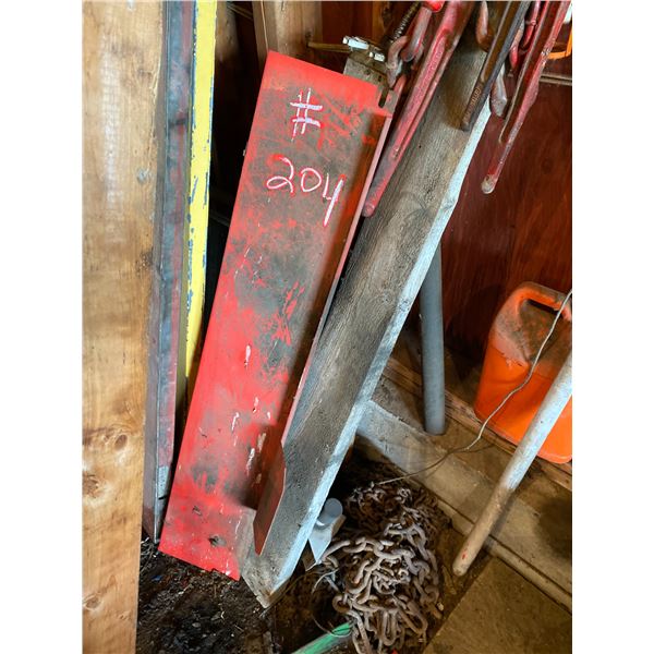 Misc. on east wall, boomers, chain ,ladder, cut off discs, partial 3pt arm & misc. , plus plywood.