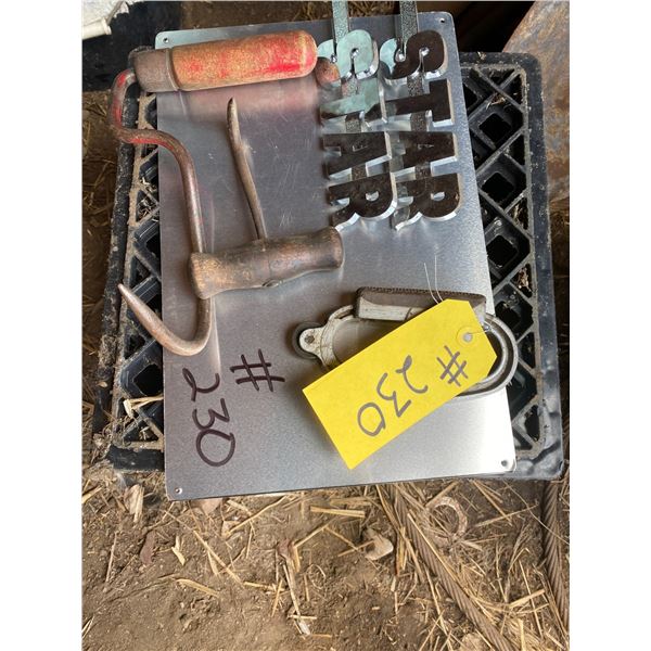 2- Bale hooks, 2- star emblems, tire tool