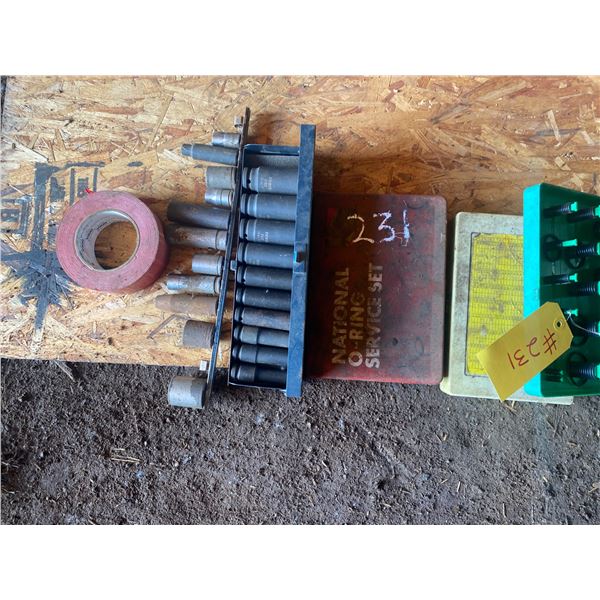 3- O-ring containers, 1/2 inch impact sockets, red duct tape