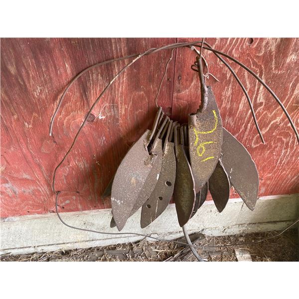 Grain lifters, belting & misc. against the wall