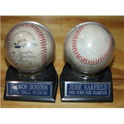 (2) SIGNED BALLS IN CASE
