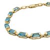 Image 2 : Blue Topaz Gemstone Line Bracelet in Yellow Gold