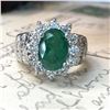 Image 3 : Oval-Cut Emerald and Stately Diamond Halo Ring