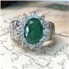 Image 4 : Oval-Cut Emerald and Stately Diamond Halo Ring