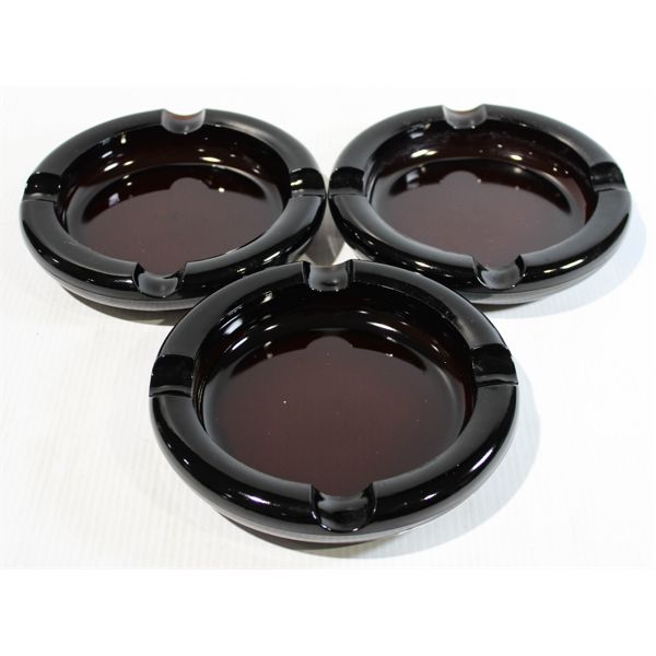 THREE HEAVY DARK GLASS VINT. ASH TRAYS