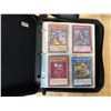 Image 1 : Lot of 1 Leather Binder with 100 Assorted YuGiOh Cards